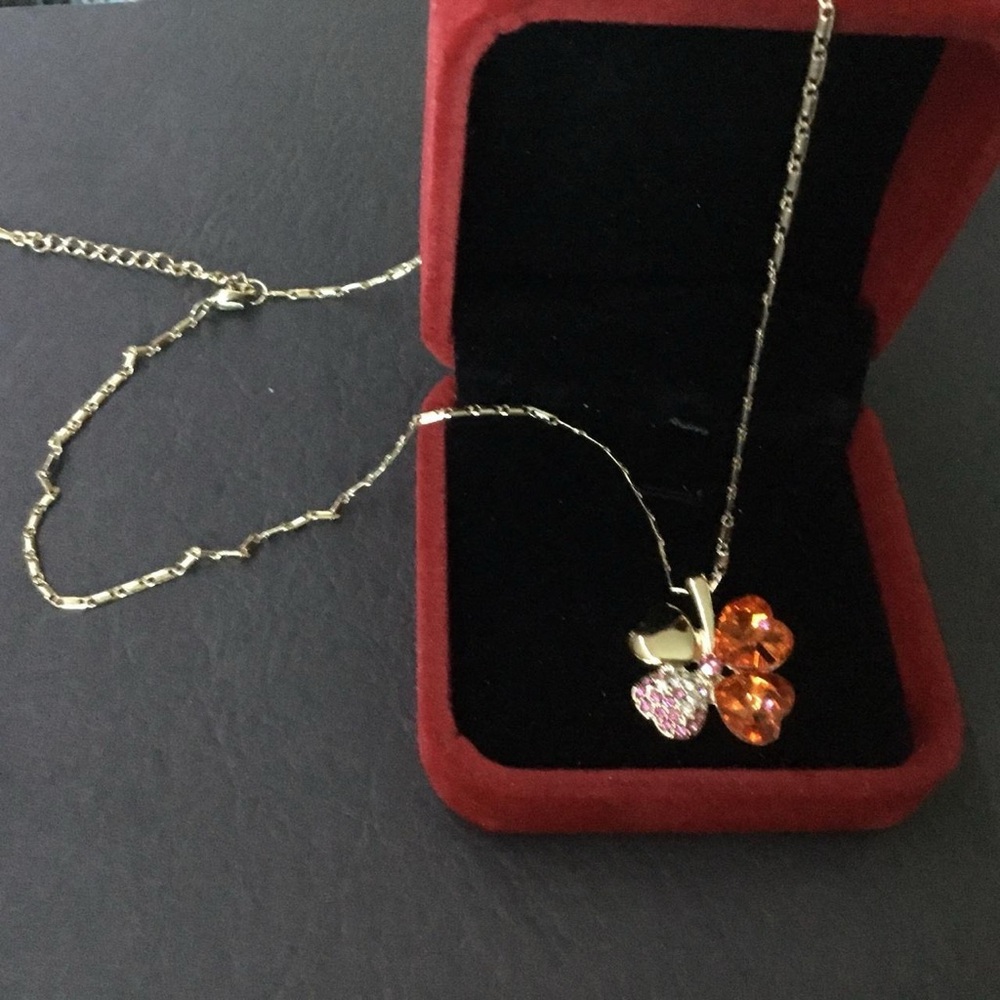 Elegant Gold and Orange Clover Leaf Pendant Necklace